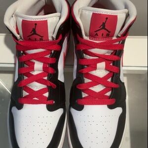 Jordan Sneakers with Red Highlights